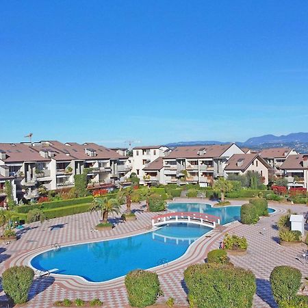 Апартаменты I Ciliegi 1-09 Con Piscina By Wonderful Italy Дезенцано-дель-Гарда Экстерьер фото